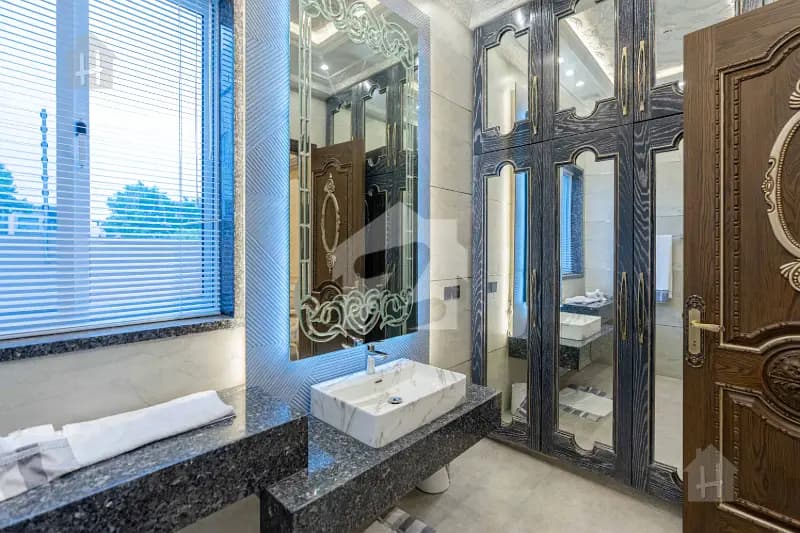 Palatial 1 Kanal Spanish-Classical Mansion with Indoor Pool & Private Cinema in DHA Phase 6, Lahore - Photo 11